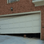 garage door repair BROKEN GARAGE DOOR