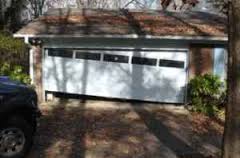 DOOR OFF TRACK Garage Doors Repair
