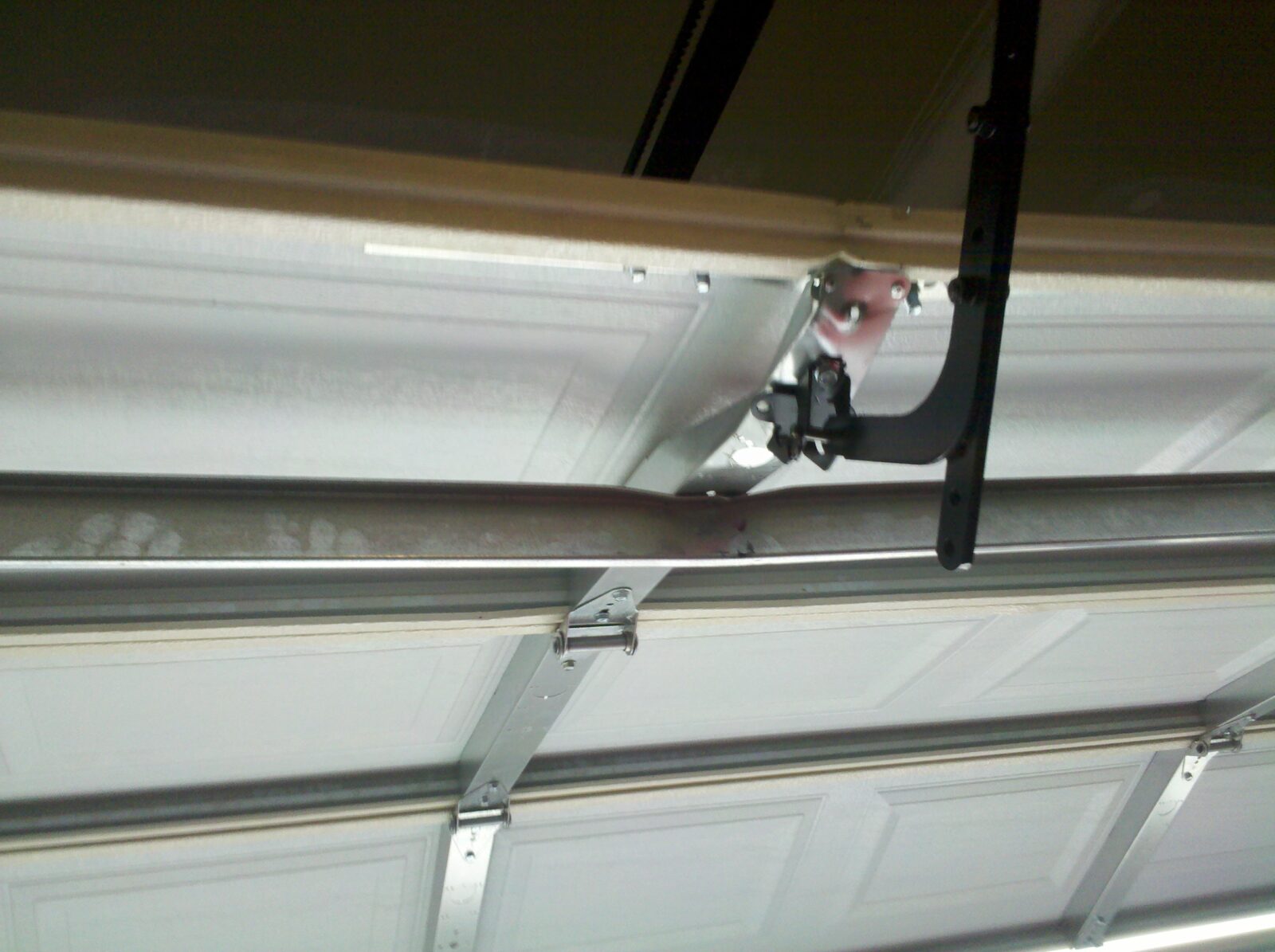 Bowing Garage Door; Fix Your Warping garage door in Parker, CO. One Clear Choice Garage Doors