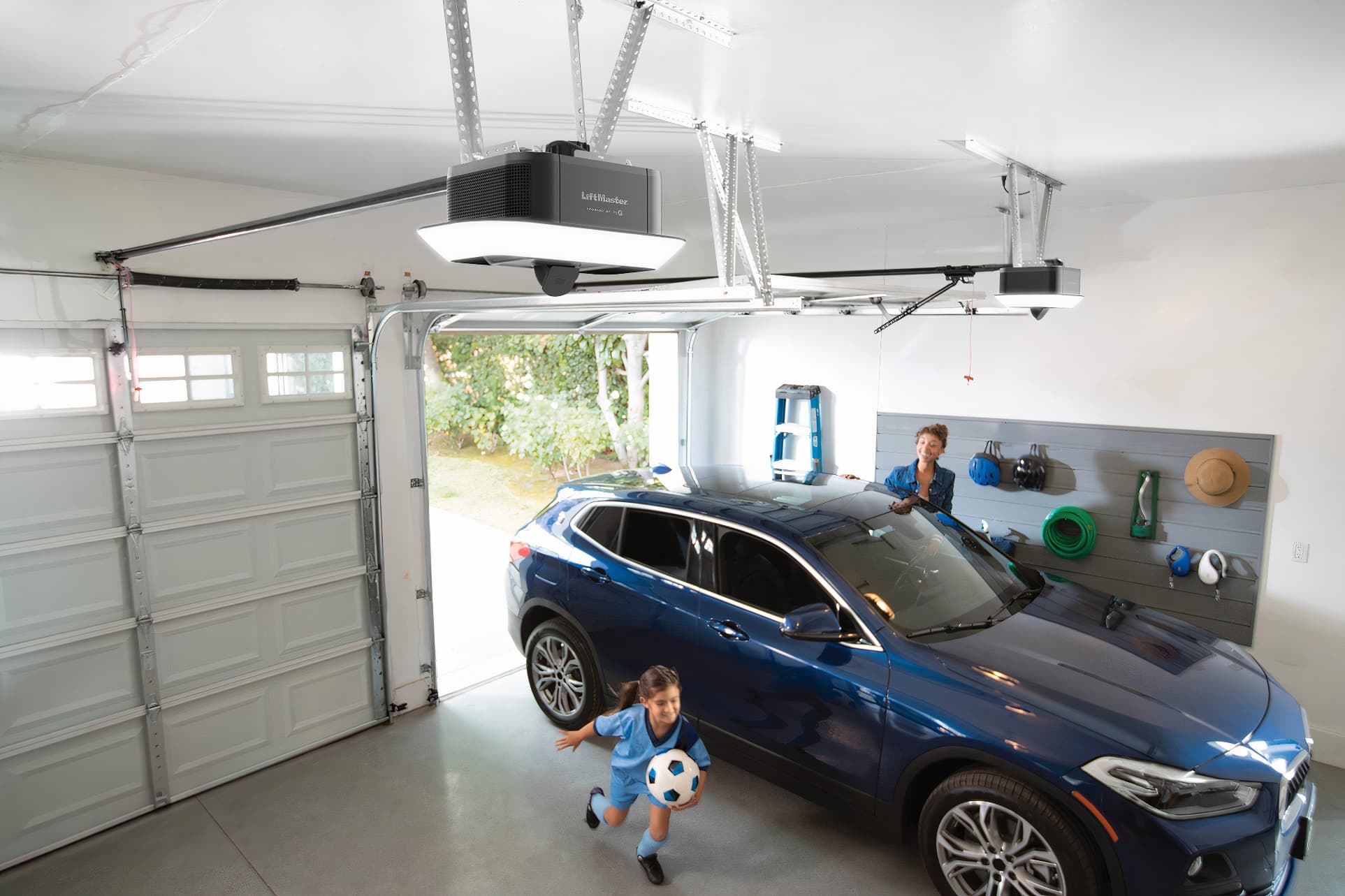 kid playing ball inside garage